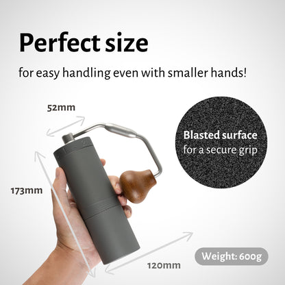 Handheld coffee grinder with measurements and text on a white background