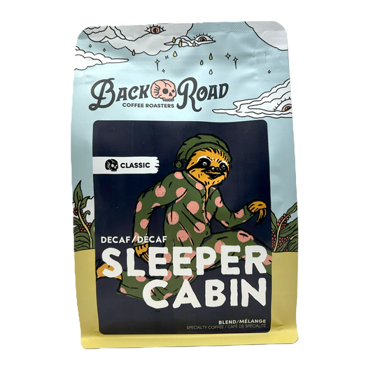 Decaf coffee bag with a sloth illustration and 'Back Road Coffee Roasters' branding