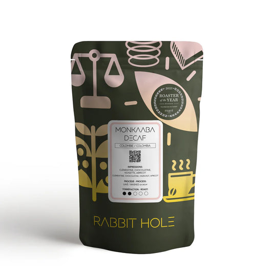 Coffee package with decorative design and branding on a white background