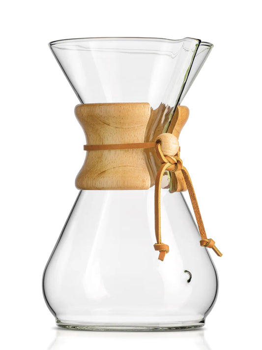 Clear glass coffee maker with wooden collar on a white background
